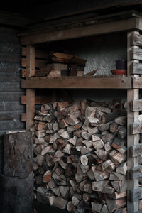 Stack of logs in forest