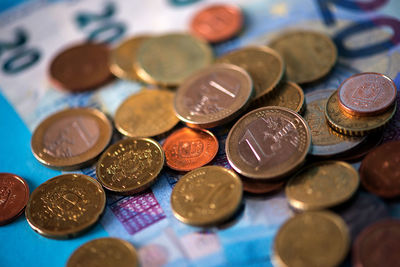 Close-up of european currency on blue background