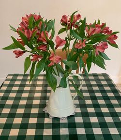 Close-up of flower vase on table