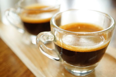 Close-up of coffee cup on table
