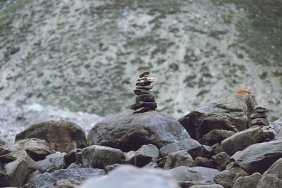 Close-up of stone stack on rock