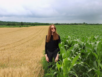 Young woman standing in farm