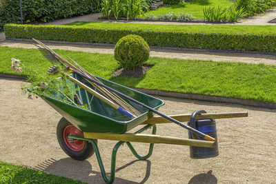 Empty park bench in garden