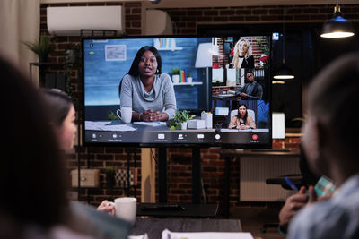 Coworkers having business meeting at office