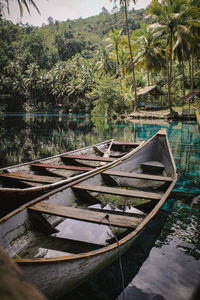 Boat moored in lake