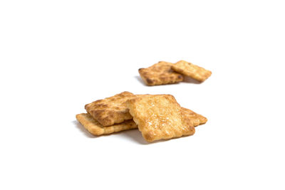 Close-up of cookies against white background