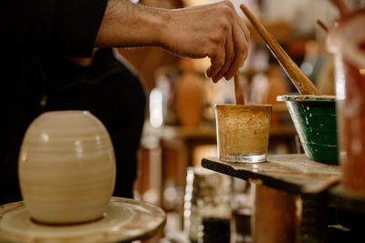 Artisan working with clay