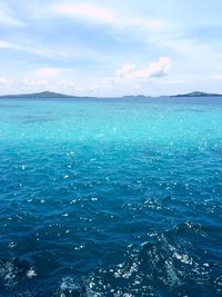 Scenic view of blue sea against sky