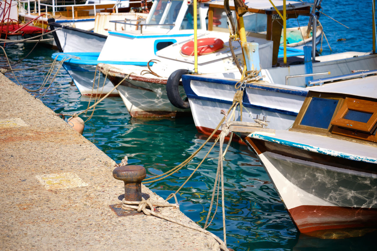 FISHING BOATS MOORED IN HARBOR