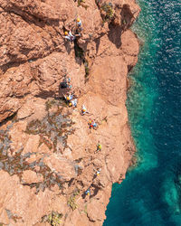 Climbers with crystal water view