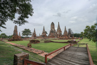 Panoramic view of temple and building against sky