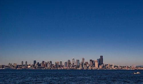 Sea with city in background