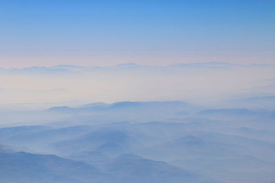 Scenic view of cloudscape against clear blue sky