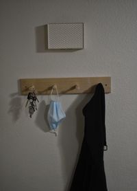 Clothes drying on wall at home