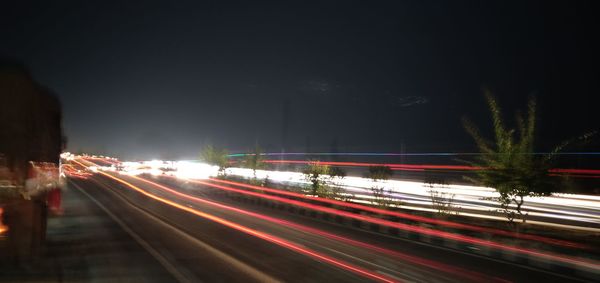 Light trails on road at night