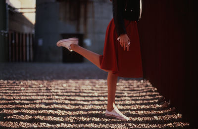 Low section of woman standing on the floor