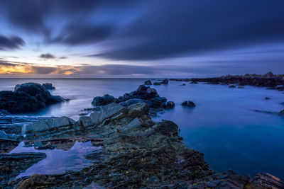 Scenic view of sea against sky during sunset