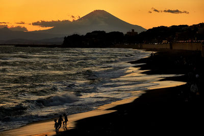 Scenic view of beach during sunset