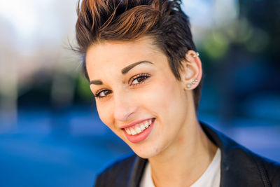 Portrait of smiling woman outdoors