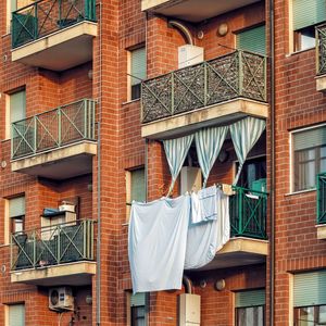 Low angle view of clothes hanging on building