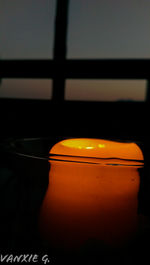 Close-up of orange on table at home