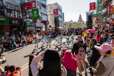 People on street in city