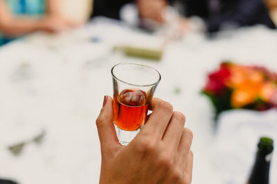 Close-up of woman holding drink