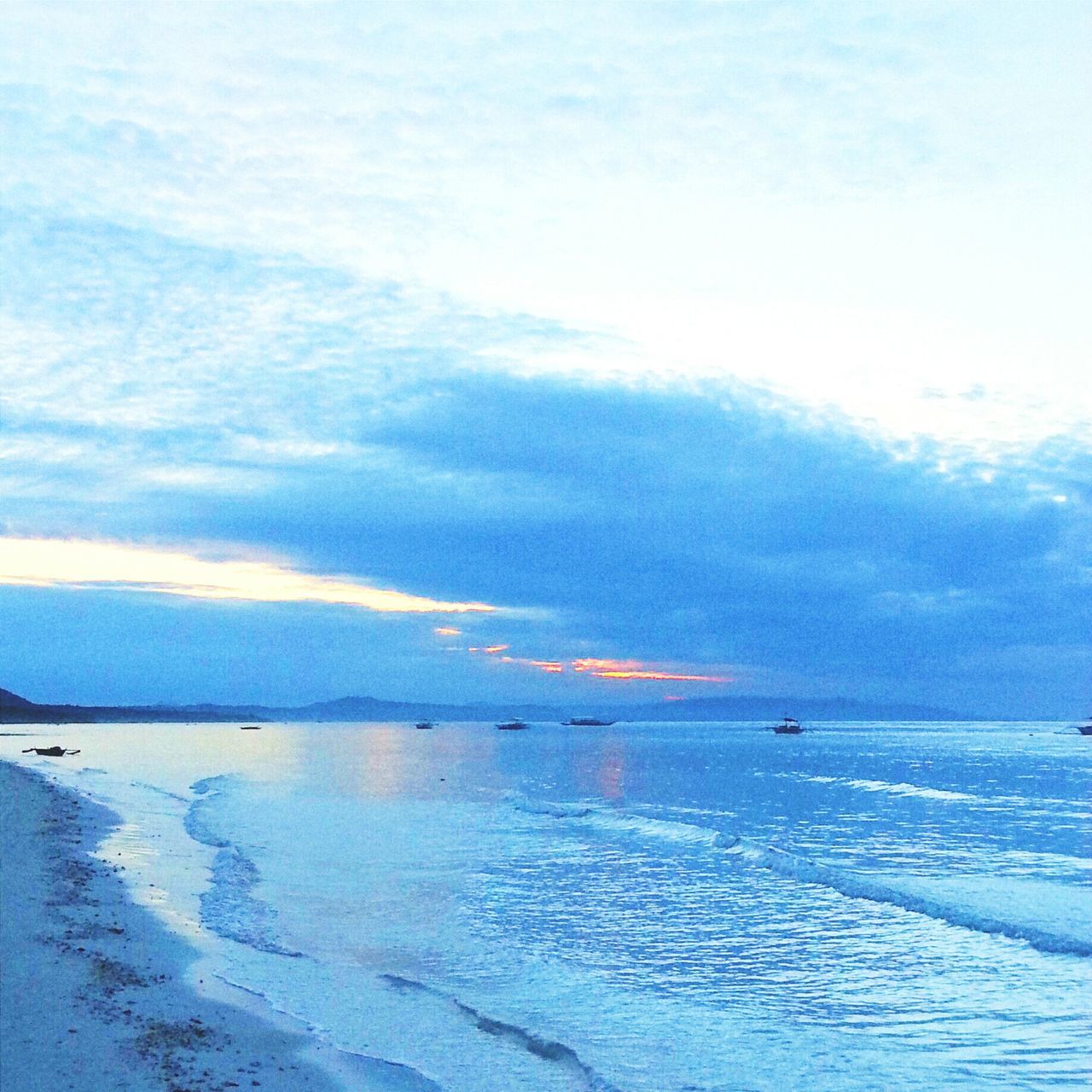 sea, water, sky, tranquil scene, tranquility, scenics, beach, horizon over water, beauty in nature, cloud - sky, nature, shore, idyllic, waterfront, cloud, sand, cloudy, blue, outdoors, calm