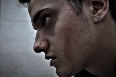 Portrait of young man looking away