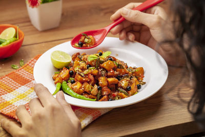 Midsection of woman preparing food