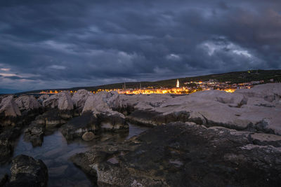 Panoramic shot of rocks on land against sky