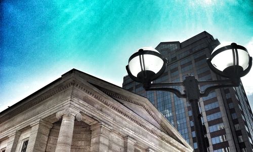 Low angle view of building against blue sky