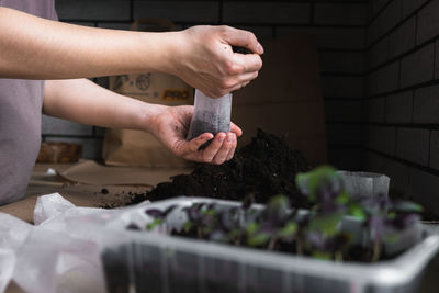 Cropped image of person preparing food