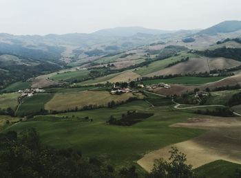 Scenic view of landscape and mountains against sky