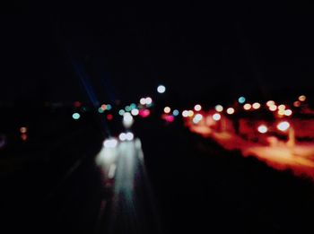 Illuminated street lights at night