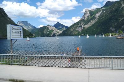 Scenic view of lake against cloudy sky