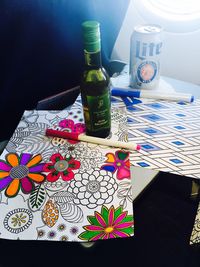 High angle view of bottles on table