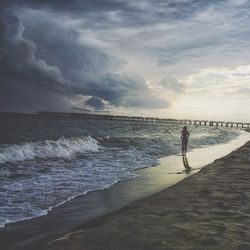 Scenic view of sea against cloudy sky