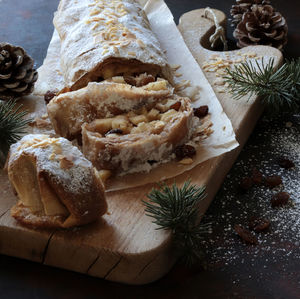 Apple strudel with phyllo pastry, cinnamon, sultanas, almonds