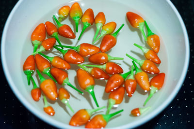 High angle view of red chilies in bowl