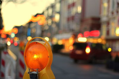 Close-up of illuminated lights at night