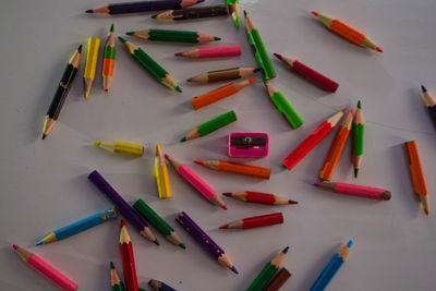 High angle view of colored pencils on table