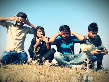 Friends sitting outdoors