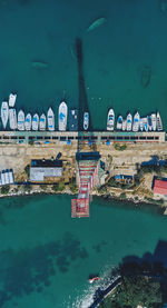 Aerial view of amazing boats at sunset. top view from the drone of the port with yacht