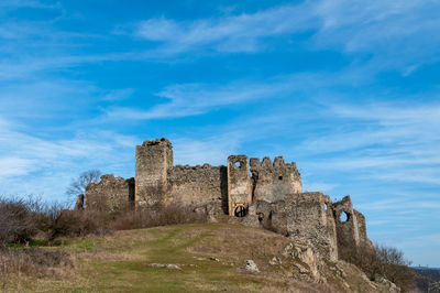 Low angle view of fort against sky