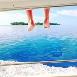 Low section of person in swimming pool