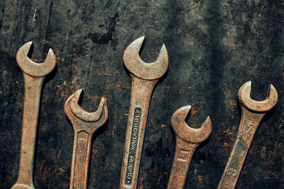 Spanners on steel surface. old rusty wrenches for maintenance. mechanic hardware tools to fix