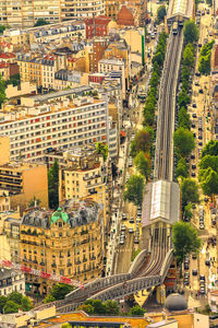 High angle view of road amidst buildings in city