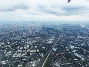 High angle view of illuminated bangkok city against sky 