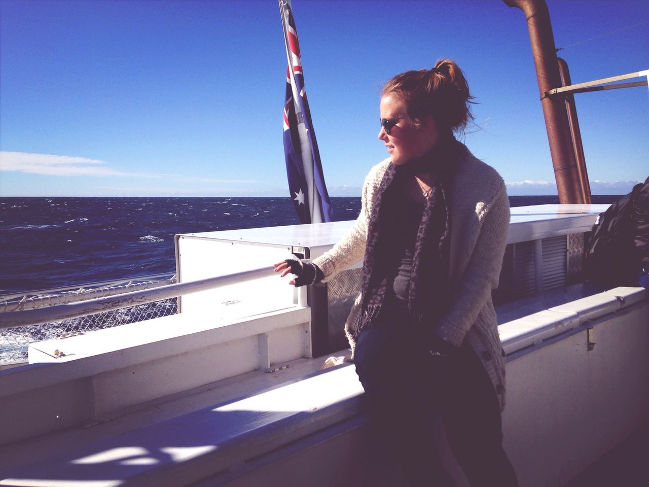 young adult, lifestyles, water, person, leisure activity, sea, young women, casual clothing, three quarter length, standing, railing, nautical vessel, sky, clear sky, side view, full length, long hair